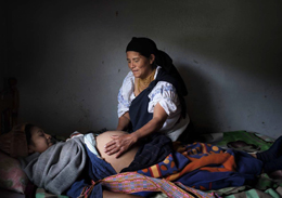 Midwife and expectant mother in Otavalo, Ecuador.